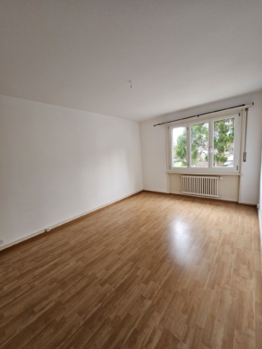 Chambre 2 - Grand logement de 5.5 pièces au 1er étage